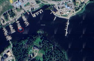 Ilmakuva Korpilahden satamasta. Merkattu imeytyspuomien paikka.