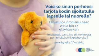 Lapsi pitää nallea sylissään.